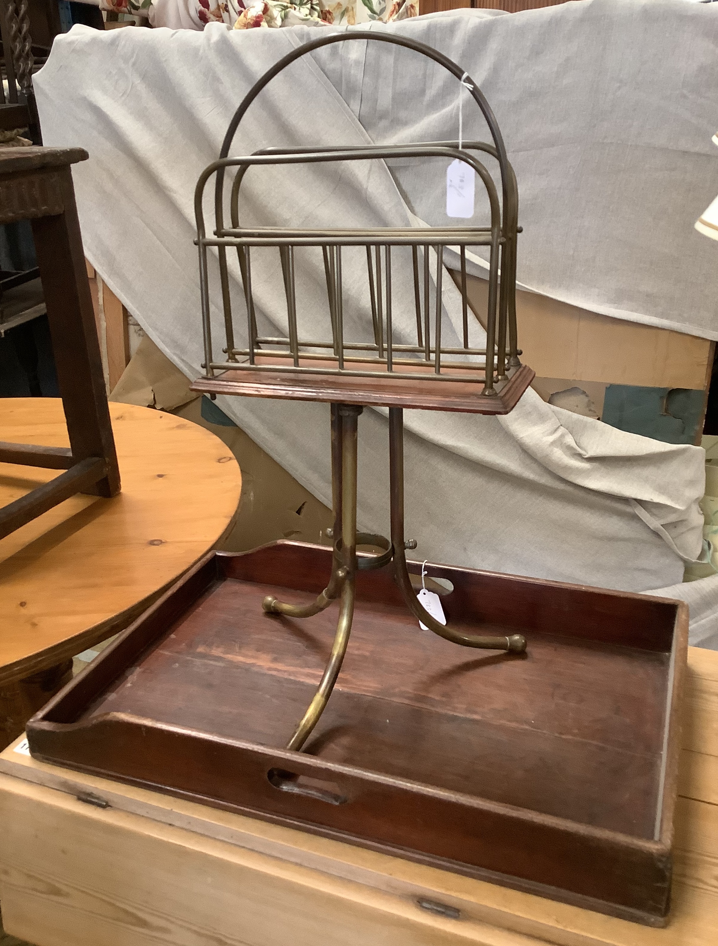 A brass framed tripod magazine stand together with a Victorian mahogany butler's tray, width 67cm, depth 42cm